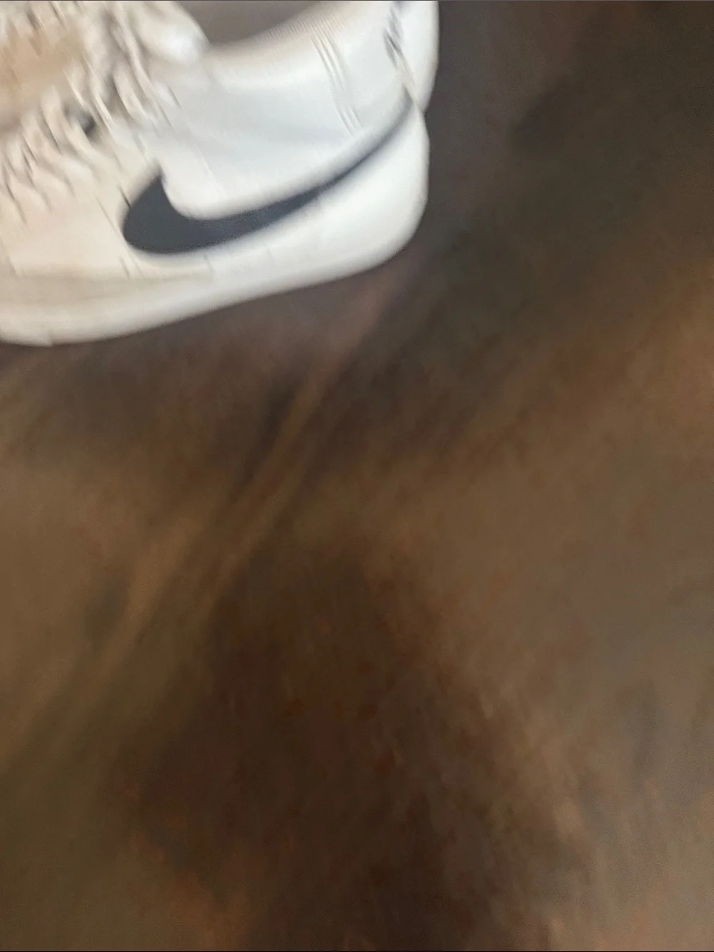 Nike High-Top Blazer Sneakers in White with Black Swoosh